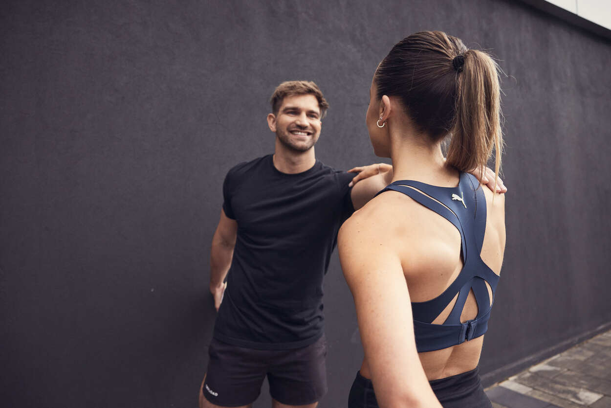 Two Partners exercise training outdoors Planet Fitness