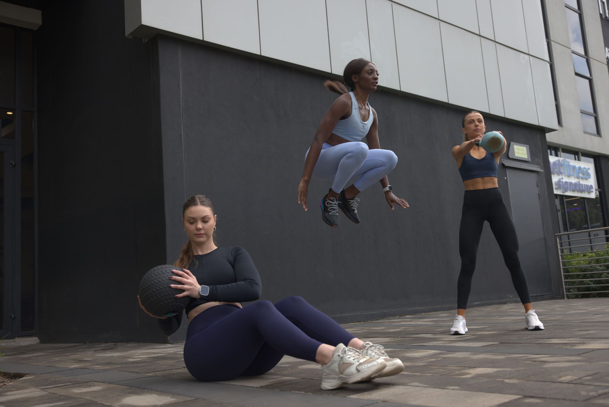 Three teens training outdoor at Planet Fitness Bryanston